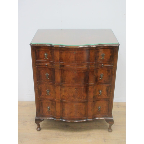 492 - A walnut veneered Chest of four long drawers on cabriole supports 3ft 1in H x 2ft 6in W