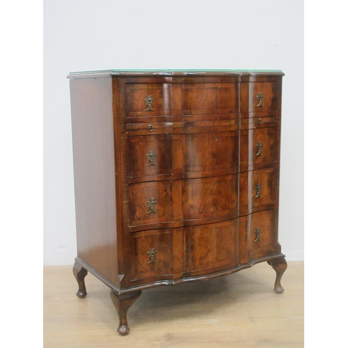 492 - A walnut veneered Chest of four long drawers on cabriole supports 3ft 1in H x 2ft 6in W