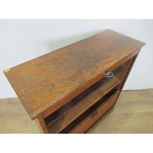 497 - An oak tambour fronted Cabinet 3ft 6in H x 3ft 3in W