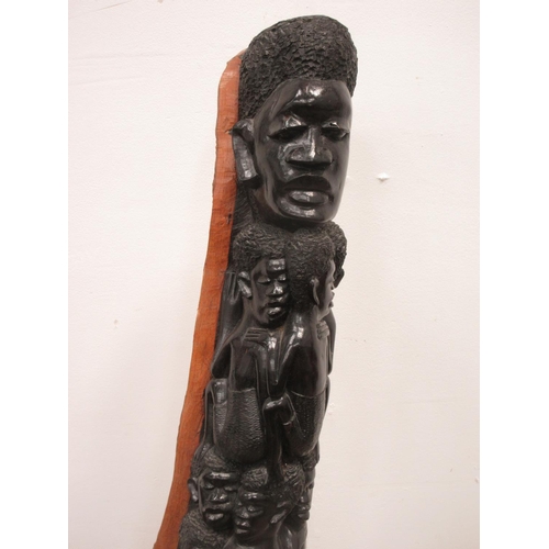 512 - A Makonde ebony carving of climbing figures 5ft 4in L