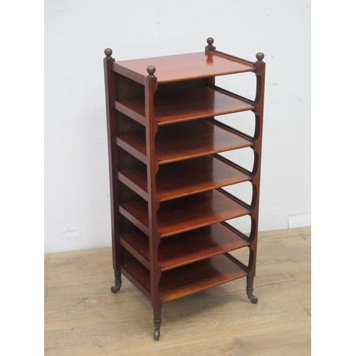 515 - An Edwardian walnut seven tier Whatnot on turned supports and ceramic casters 3ft 3in H x 1ft 5in W