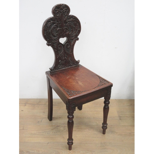 516 - A 19th Century mahogany and inlaid Elbow Chair, a Victorian carved oak Hall Chair, Victorian mahogan... 