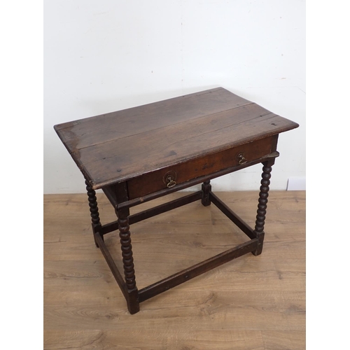 106 - A late 17th Century oak Side Table fitted single frieze drawer mounted upon bobbin turned supports 2... 