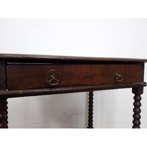 106 - A late 17th Century oak Side Table fitted single frieze drawer mounted upon bobbin turned supports 2... 