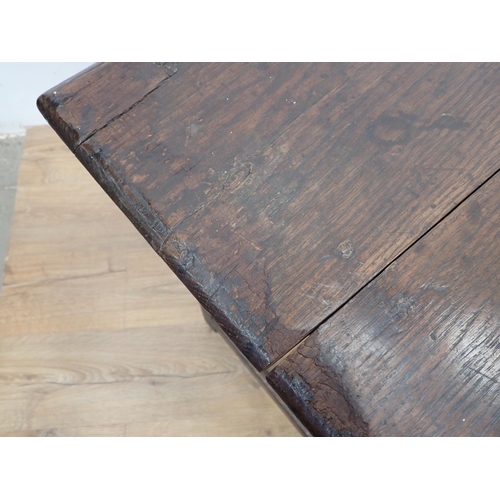 106 - A late 17th Century oak Side Table fitted single frieze drawer mounted upon bobbin turned supports 2... 