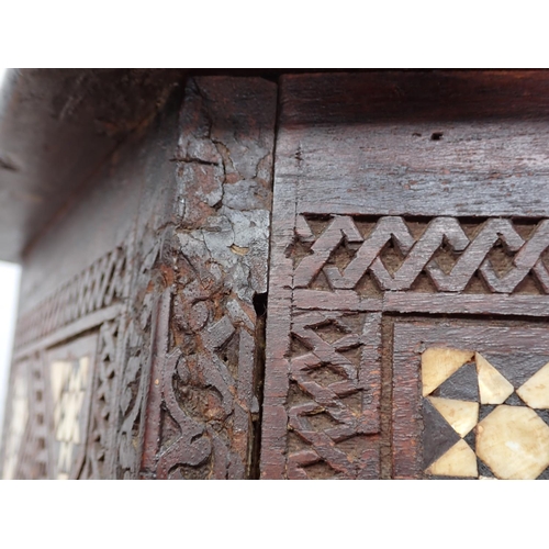 11 - A North African carved hardwood and mother of pearl inlaid hexagonal Table 1ft 10in W x 1ft 9in H