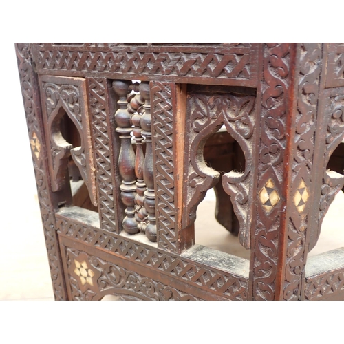 11 - A North African carved hardwood and mother of pearl inlaid hexagonal Table 1ft 10in W x 1ft 9in H