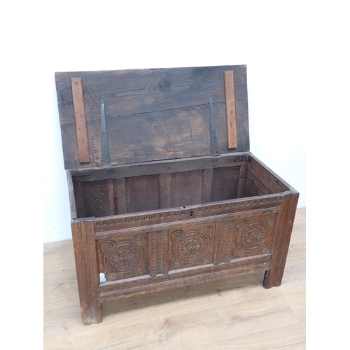 112 - An antique oak Coffer with later top and carved three panel front 3ft 6in W x 2ft 1in H