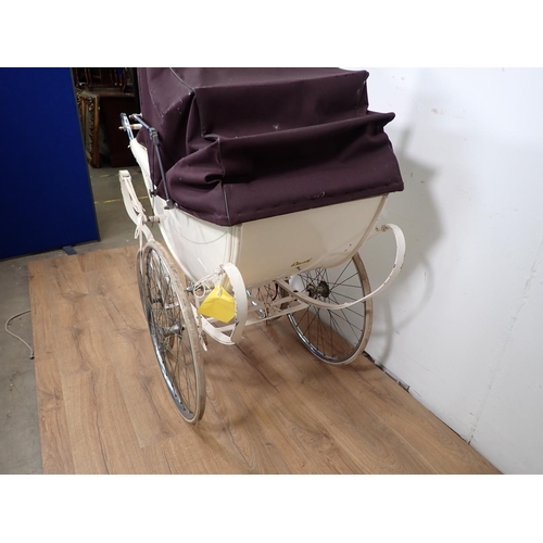 12 - A vintage white Pram with spoked wheels 4ft 5in L