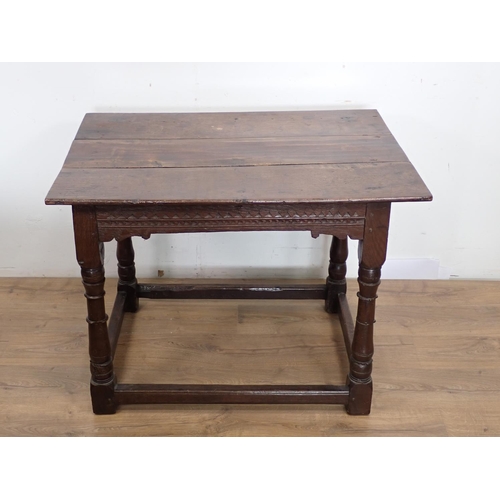 122 - A late 17th Century oak Altar Table with turned supports united by surrounding stretchers 3ft 2in W ... 