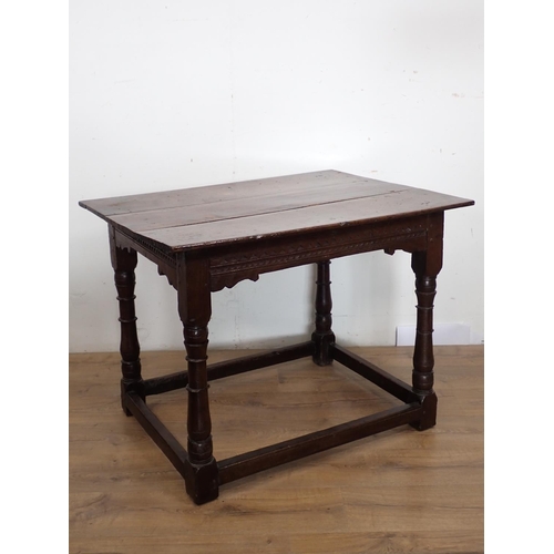 122 - A late 17th Century oak Altar Table with turned supports united by surrounding stretchers 3ft 2in W ... 