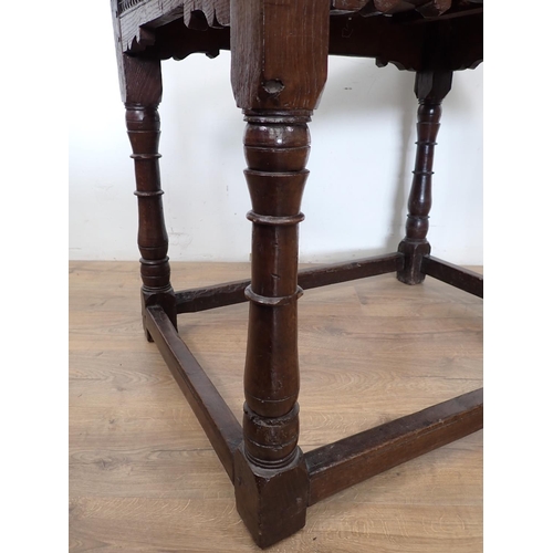 122 - A late 17th Century oak Altar Table with turned supports united by surrounding stretchers 3ft 2in W ... 