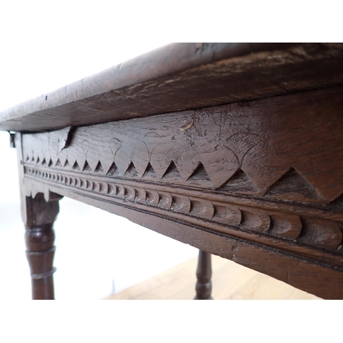 122 - A late 17th Century oak Altar Table with turned supports united by surrounding stretchers 3ft 2in W ... 