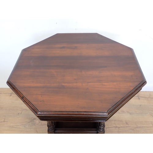 125 - A Victorian walnut octagonal Centre Table on ring turned supports 2ft 5in W x 2ft 5in H