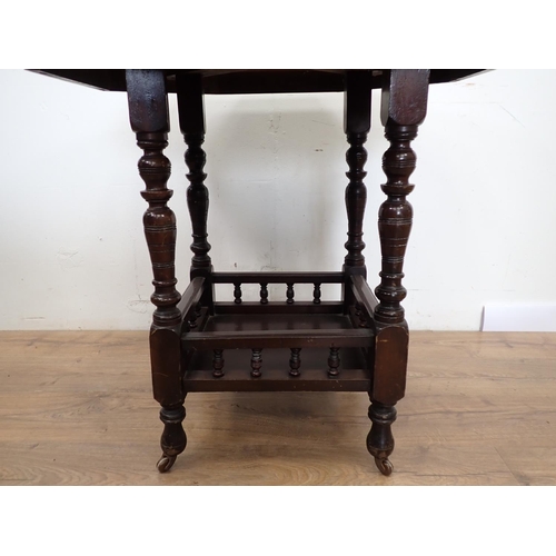 125 - A Victorian walnut octagonal Centre Table on ring turned supports 2ft 5in W x 2ft 5in H