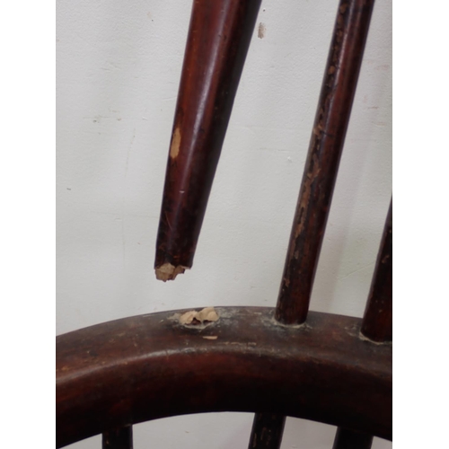 13 - A 19th Century ash and elm Windsor Armchair with pierced splat back on turned supports united by cri... 