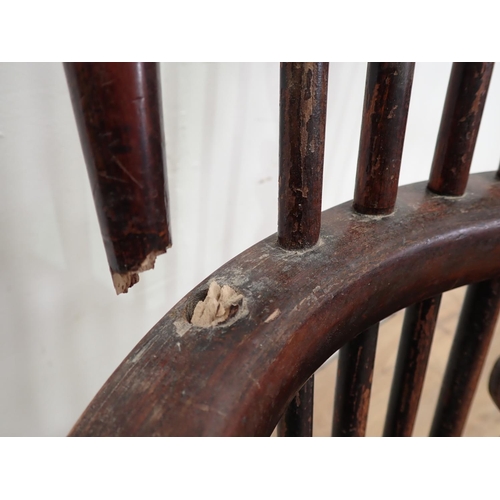 13 - A 19th Century ash and elm Windsor Armchair with pierced splat back on turned supports united by cri... 