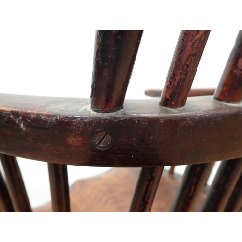 13 - A 19th Century ash and elm Windsor Armchair with pierced splat back on turned supports united by cri... 