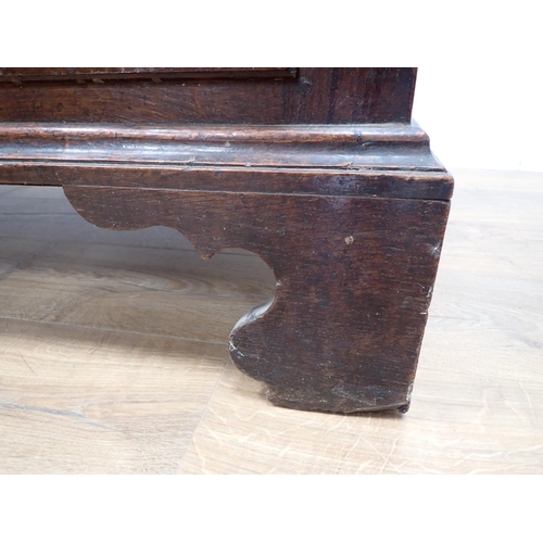 130 - An 18th Century oak Lancashire Chest with hinged lid having later alteration above panel front fitte... 