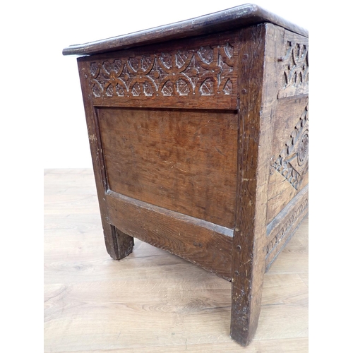 133 - A late 17th/early 18th Century oak Coffer of small proportions with sunken two panel lid above rose ... 