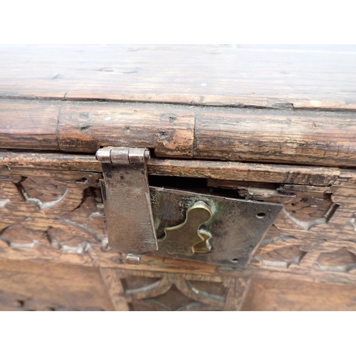 133 - A late 17th/early 18th Century oak Coffer of small proportions with sunken two panel lid above rose ... 