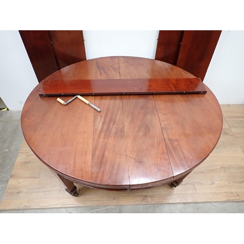 136 - A 19th Century mahogany and inlaid extending Dining Table with five spare leaves mounted upon square... 