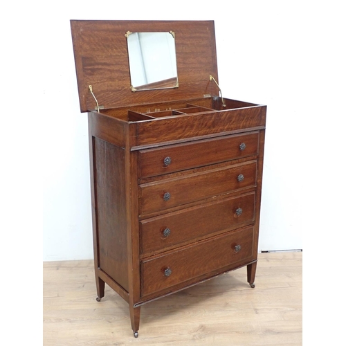 143 - An oak Dressing Chest of four drawers with hinged lid 3ft 8in H x 3ft W