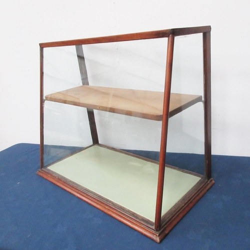 22 - A mahogany and glazed table top Display Cabinet with sloping front 2ft 5in W x 2ft H