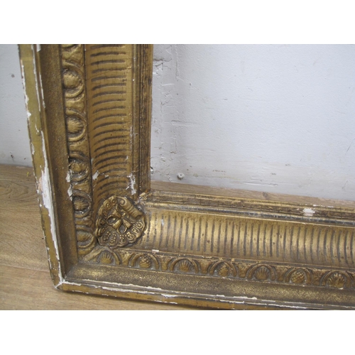 282 - A nineteenth century gilded and carved frame, rebate size 24 1/2 x 18 1/4in, A/F