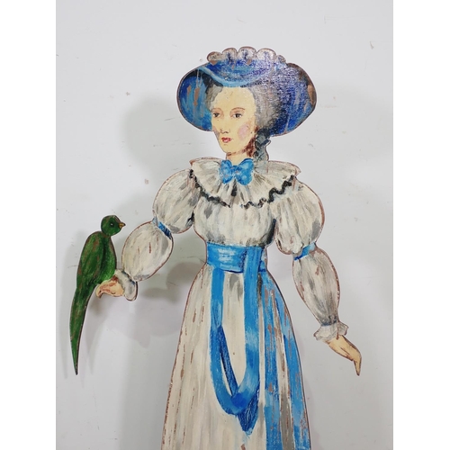 374 - Three cut out painted wooden figures of Ladies in period costume  3ft 6in H, 3ft 3in H and 2ft 9in H