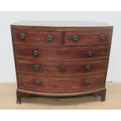 387 - A 19th Century mahogany and crossbanded bow fronted Chest of two short and three long drawers 3ft 6i... 