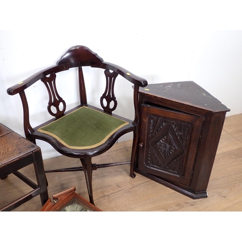 392 - A carved oak hanging Corner Cupboard, an 18th Century oak single Chair, a mahogany Corner Chair and ... 