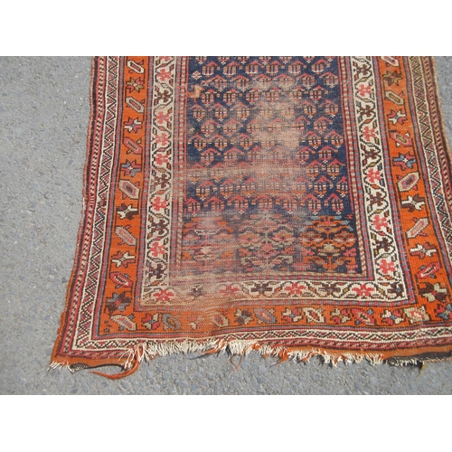 397 - A bordered Shirvan Runner, the central field with all-over boteh on a blue ground, 11ft 3in x 3ft 7i... 