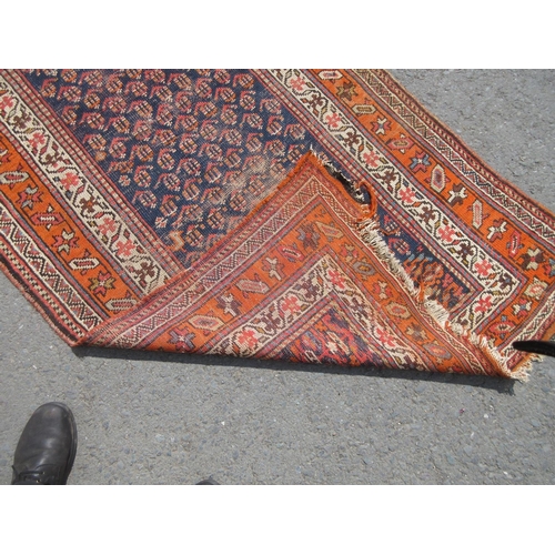 397 - A bordered Shirvan Runner, the central field with all-over boteh on a blue ground, 11ft 3in x 3ft 7i... 