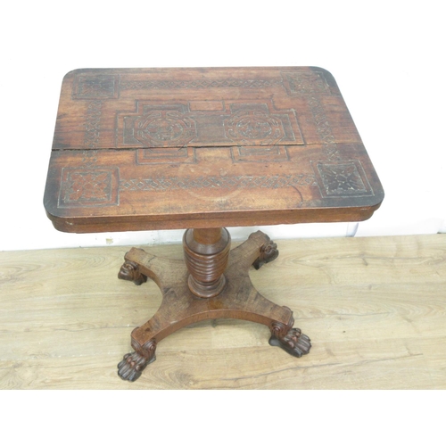 403 - A 19th Century carved padauk or teak Occasional Table with carved rectangular top of four paw feet 2... 