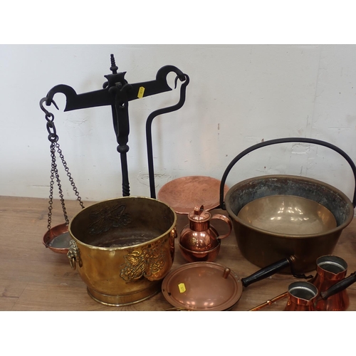 421 - A quantity of brass and copperware including Jam Pan, Jelly Mould, Wine Bucket, Charger, Measures, e... 