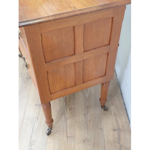 423 - A walnut Dressing Chest by Arthur Romney Green (Cotswold School) fitted two drawers on turned caster... 