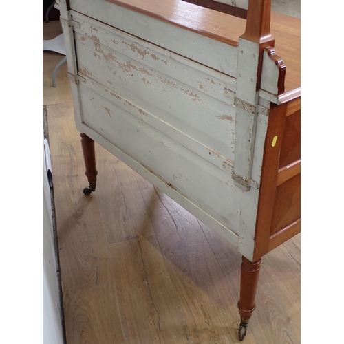 423 - A walnut Dressing Chest by Arthur Romney Green (Cotswold School) fitted two drawers on turned caster... 