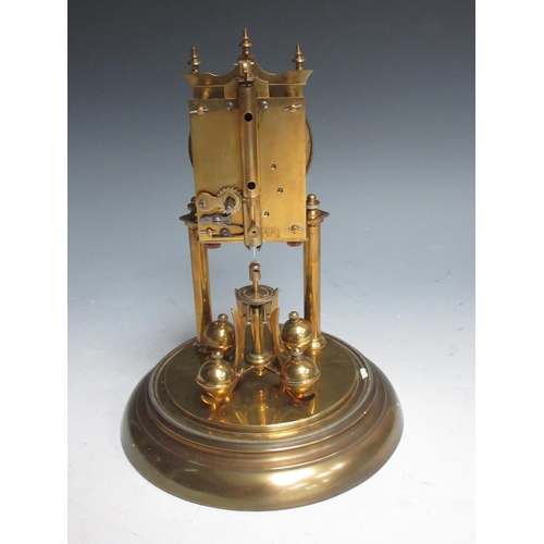 425 - A late 19th Century brass Clock under glass dome 11in H