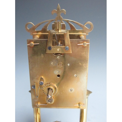 426 - A brass Clock under glass dome 11 1/2in H