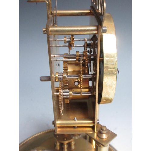 426 - A brass Clock under glass dome 11 1/2in H