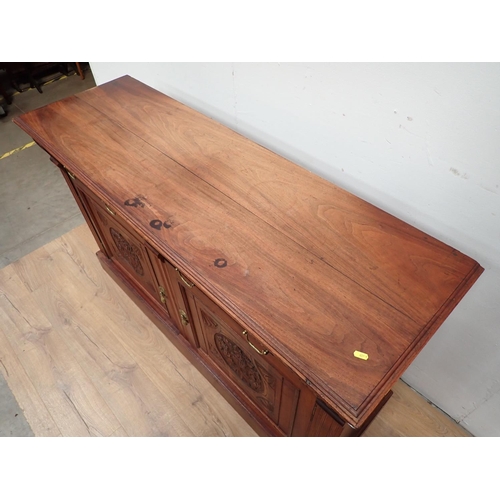 447 - A Victorian carved walnut Sideboard fitted two frieze drawers and two cupboard doors 4ft 11in W x 3f... 