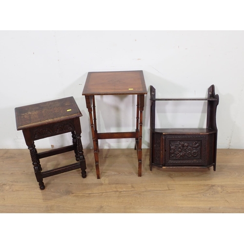 63 - An oak Box Stool, a carved Wall Cabinet and a mahogany Occasional Table