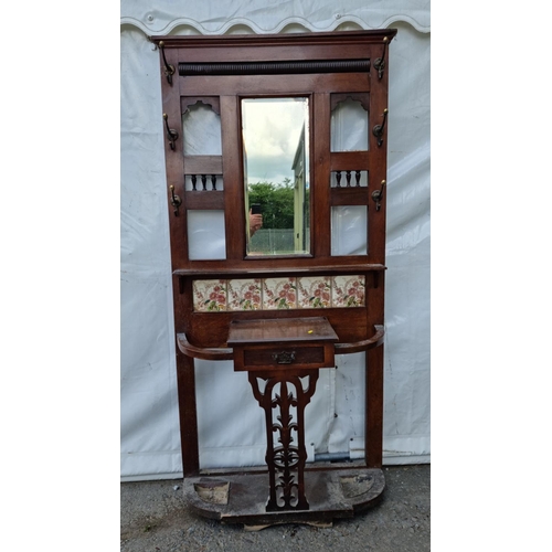 811 - A oak Bedstead 4ft 7in W (woodworm) and a Victorian walnut Hallstand 6ft 6in H x 3ft 2in W