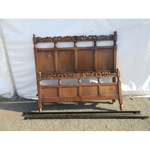 811 - A oak Bedstead 4ft 7in W (woodworm) and a Victorian walnut Hallstand 6ft 6in H x 3ft 2in W