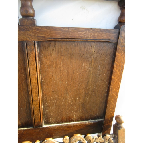 811 - A oak Bedstead 4ft 7in W (woodworm) and a Victorian walnut Hallstand 6ft 6in H x 3ft 2in W