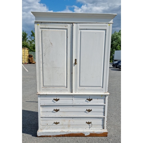 818 - A painted oak Linen Cupboard with two doors above two short and two long drawers 6ft 10ins H x 4ft 2... 