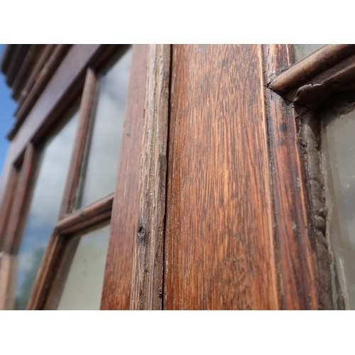 813 - A Georgian oak and astragal glazed standing Corner Cabinet fitted pair of cupboard doors to base on ... 