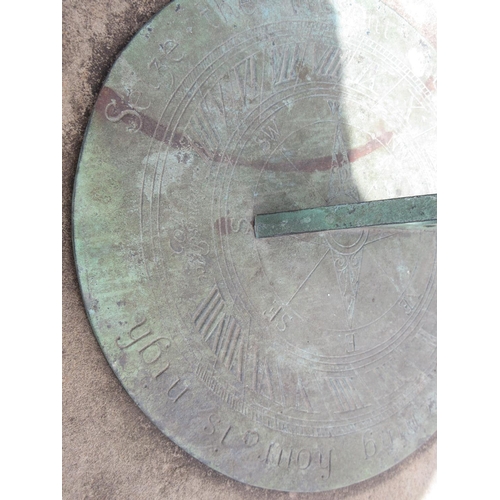 301 - A concrete Sundial on circular column with metal dial in the 17th Century style, 3ft 10in H