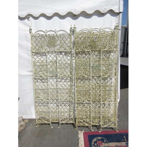 303 - Four cream painted metal folding Racks, 6ft H x 2ft 6in W